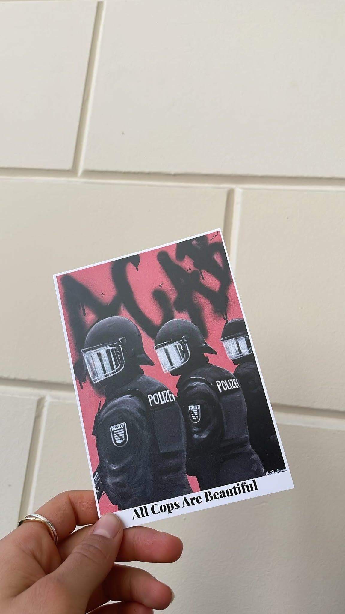 "Cop in Pink" Postkarte by Amelie Sindermann